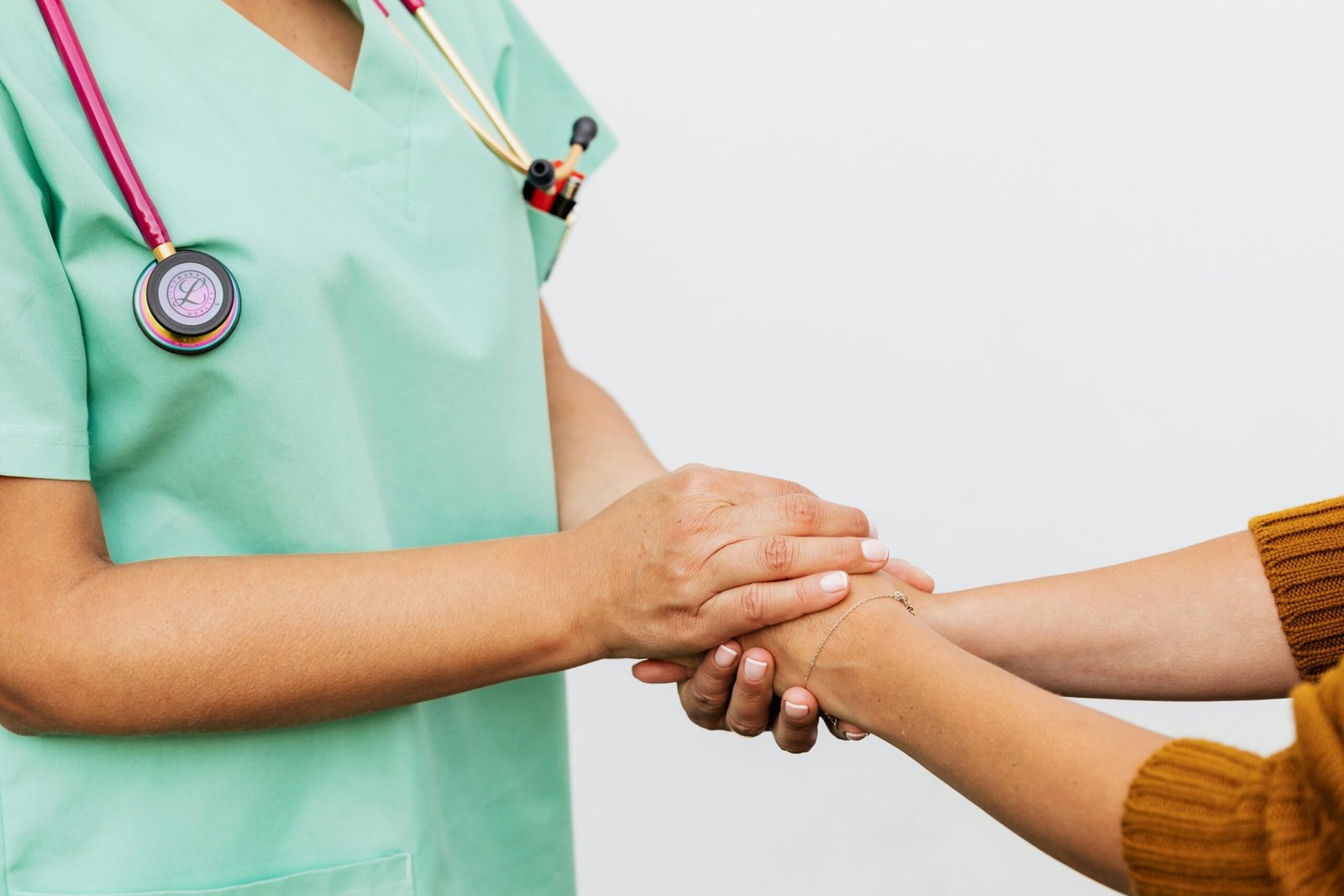 Medical professional consulting a patient online via laptop for telehealth services.